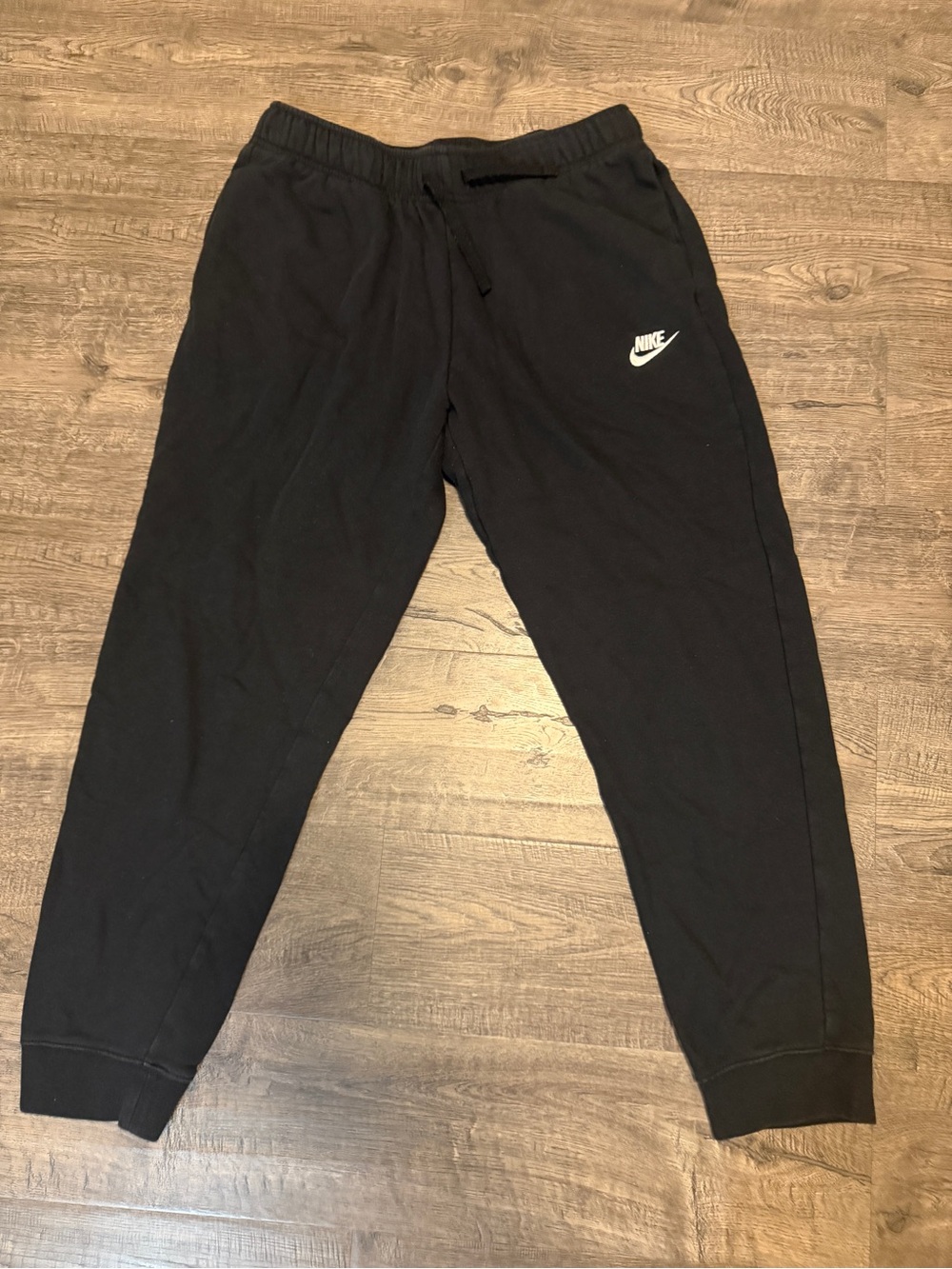 Nike Black Kids Sweatpants with White Swoosh